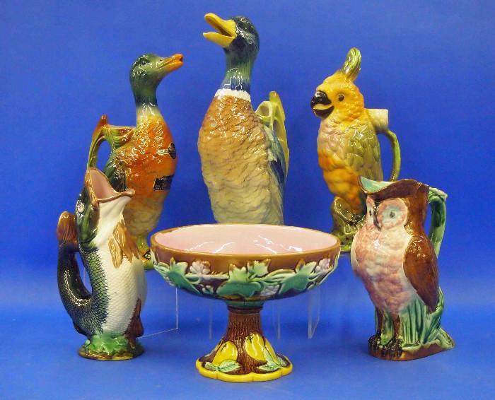 Garnier and St. Clement Figural Bottles with Majolica Figural Bottles, Pitchers, and a Compote