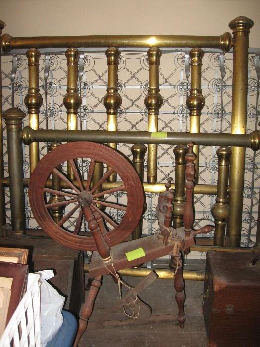 Spinning wheel and brass bed