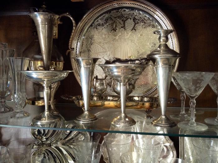 Several pieces of sterling (vases, dishes, etc)