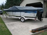 Smoker Craft boat showing cover that is included