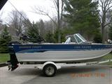 1995 Smoker Craft 19'6" boat on Shore-Landr trailer. 150 hp Mercury outboard plus 9.9hp Force trolling motor. Well equipped for fishing on small lakes or on Lake Michigan.