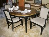Dining table with 2 leaves and 4 chairs on casters