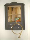 Hanging corner cupboard.