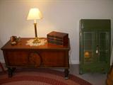 1920's cedar chest (water stain on top), old photos, Country Store Adhesive Tape display, Hanging cupboard