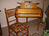 Wurlitzer "Butterfly" 44 key child's grand piano with spindle back chair