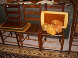 Set of rush seat ladderback chairs, Trays are from Camfield in Grand Haven, Longaberger baskets