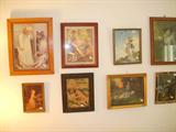 Wall of vintage prints, most are of children