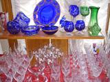 Blue and green cut-to-clear glassware along with some of the sets of stemware