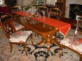 Widdicomb dining table with inlaid border, 3 leaves (one in place in photo), 6 side chairs and 2 captains chairs. Has always had the pads on it, so it is in like-new condition