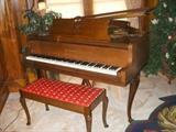1975 Knabe mahogany baby grand in like new condition.