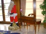 Life size (store display?) Santa Claus beside a Widdicomb desk and chair