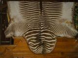 Zebra Hide. Was used on the floor, and has suffered wear