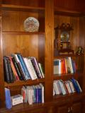Sample of books in library. Howard Miller shelf clock with triple chime 8-day movement
