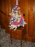 Patriotic Christmas tree on a 19th century 2-drawer walnut stand