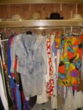 One of the 5 sections full of women's clothing in the walk-in cedar closet. sizes range from small to large.....