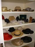 Lady's hats and fashion accessories in the large walk-in closet on the second floor