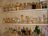 Her collection of (unfortunately) empty perfume bottles by Chanel, Nina Ricci and many Clive Christian bottles, both for men and women
