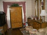 Bedroom suite. Dresser top has burn marks. Armoire is in nice condition