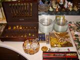 Gold stainless flatware, African animal design items.