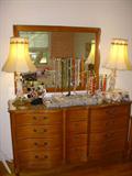 Serpentine front dresser, Figural lamps, Costume jewelry