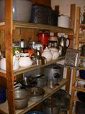 Shelves full of kitchen cookware