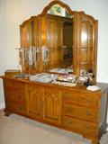 Thomasville 9-drawer dresser with triple mirror.  Costume jewelry on top.