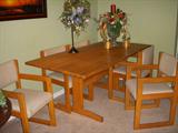 Table & chairs, with decorative items on top