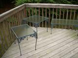 Indoor/outdoor glass top iron base tables