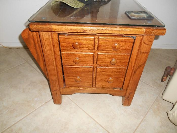 This cute little side table is very solidly made, heavy and has a matching coffee table that is equally well built.