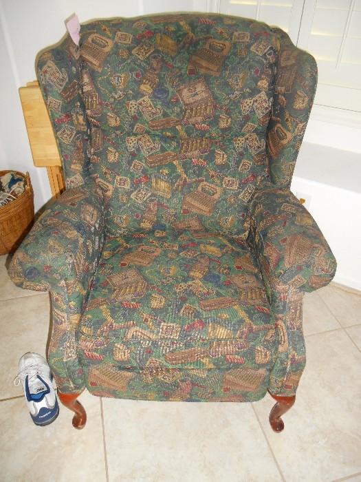Check out the pattern on this wing back chair...it's a Vegas theme.