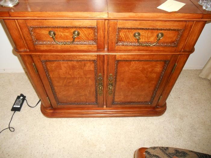 Buffet/serving piece matches the formal dining room table and chairs and matching china hutch.