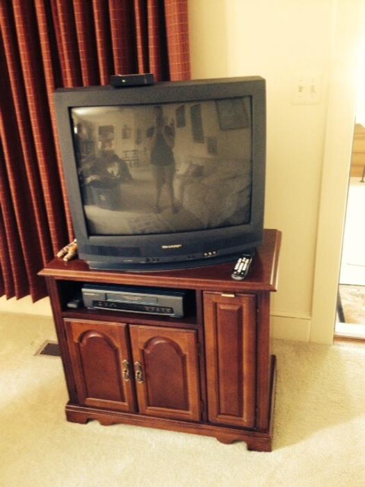 TV, stand, VCR all together. & movies inside!