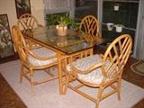 Lovely rattan and glass dining table
