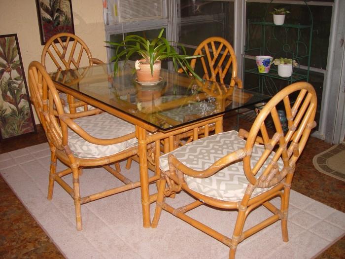 Lovely rattan and glass dining table