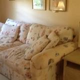 Lovely off white sofa with quaint floral pattern