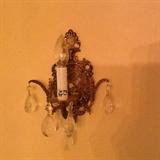 1 of a pair of sconces that match the chandelier and also a mirror....can be sold seperately