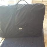 Oakwood Massage table folded up and packed in its carry case ready to go