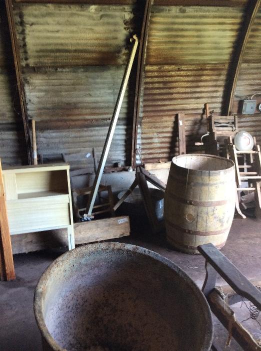 old cast kettle and washtub stands