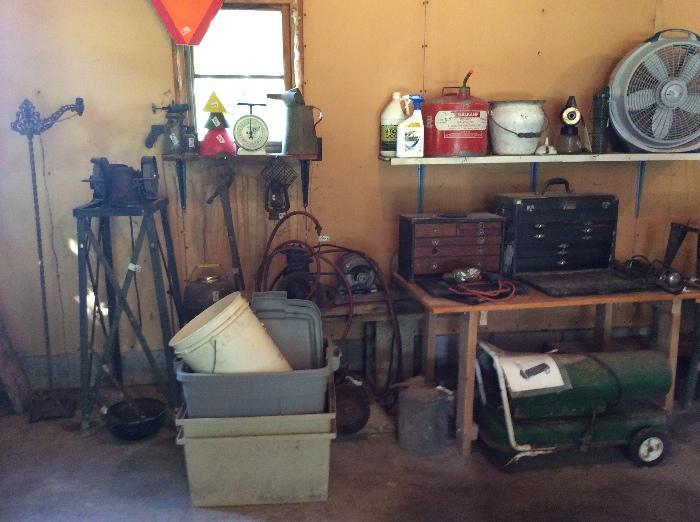 old bench grinder and old tool boxes