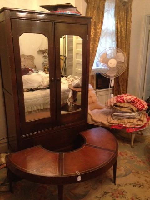 Antique wardrobe, half-moon table, chaise lounge. Third floor.