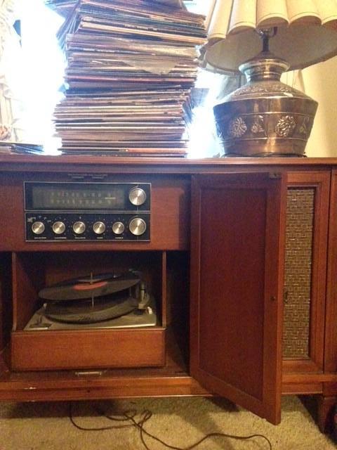 Stereo cabinet with record player and records. Third floor.
