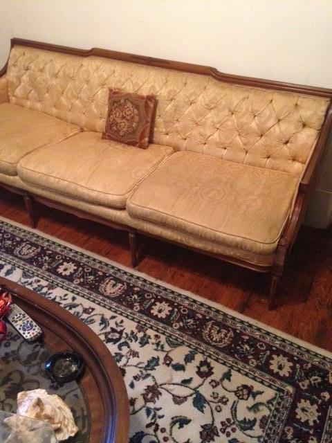 Another vintage sofa, rug, coffee table. Second floor.