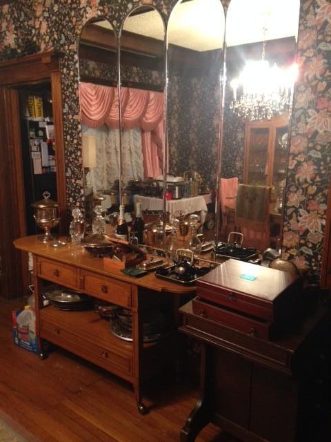Buffet, writing desk, silver, serving pieces and other smalls. First floor. Dining room.