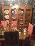 Dining table and chairs. Hutch/china cabinet. More serving pieces and small. Dining room. First floor.