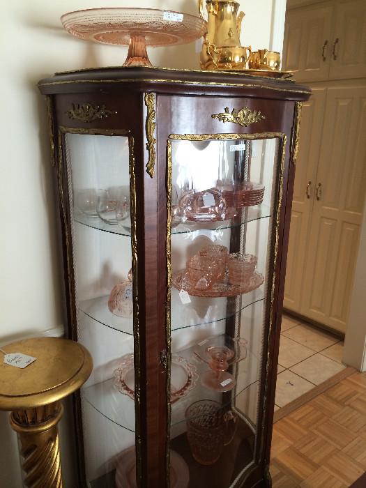        Gilded plant stand; ornate display cabinet; assorted pieces of depression glass