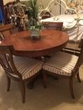      Small dining table with 4 chairs; full iron bed;