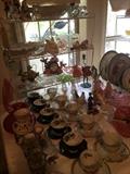         More cups & saucers; colorful glassware;