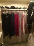             Large assortment of clothes & shoes;