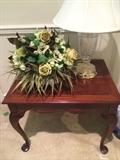 End table; 1 of several lovely floral arrangements & lamps;
