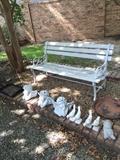                   White yard bench ; garden art;